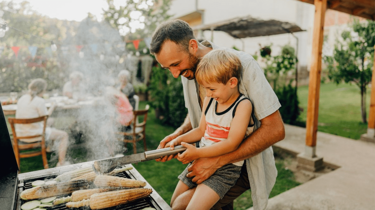 father and son looking after the barbecue | Gillette UK