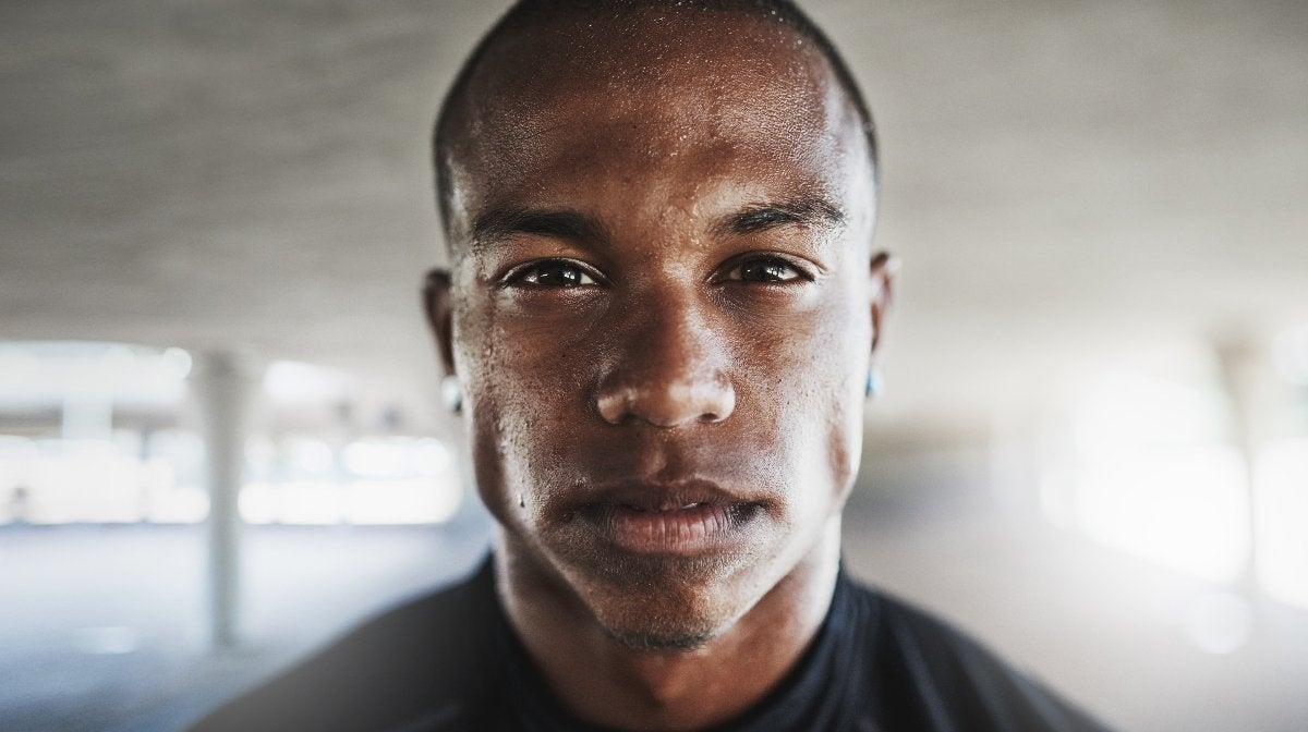 Close up of a man with beads of sweat on his face | Gillette UK