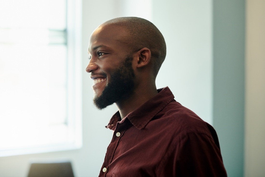 Side profile of a man with a medium beard style | Gillette UK