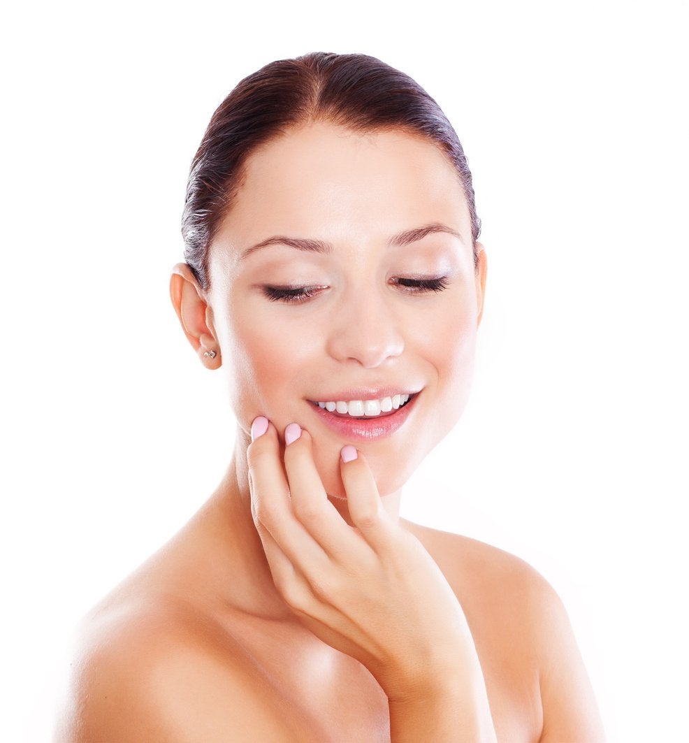 Woman with smooth skin looking down | Gillette Venus UK