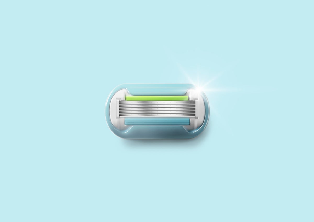 A single Venus razor blade against a pale blue background | Venus UK