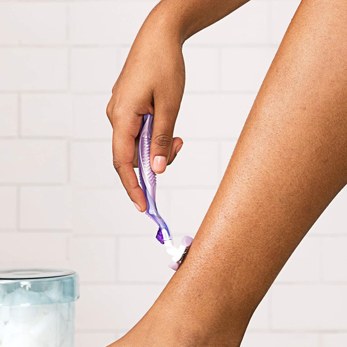 Close up of a woman shaving her leg with a Gillette Venus razor | Gillette Venus UK