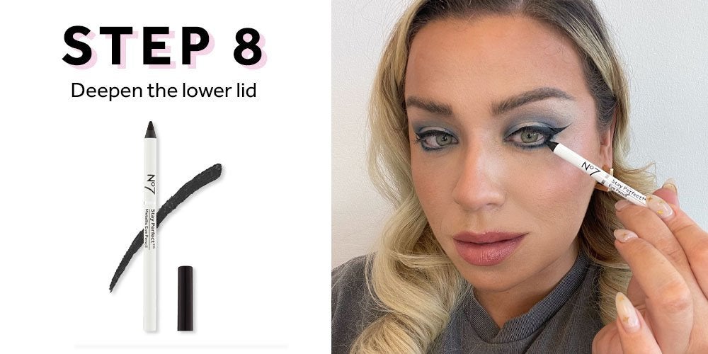 Woman applying eyeliner
